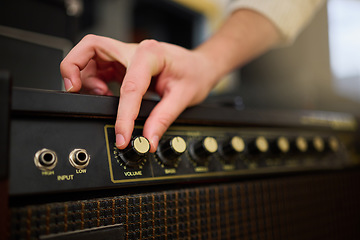 Image showing Hands, amplifier volume and music studio with female musician or producer with equipment. Technology, audio and hand of woman adjusting sound nob on dj machine or radio amp in creative workplace.