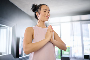 Image showing Yoga, meditate and woman with gratitude for her mind, peace and calm start to the morning. Hope, freedom and Asian girl in the living room for a mindset exercise, spiritual faith and mindfulness