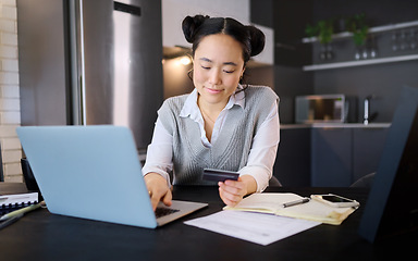 Image showing Online shopping, credit card and Asian woman typing on laptop for banking or payment in home kitchen. Ecommerce, fintech and female with computer for buying, paying bills or finance budget at night.