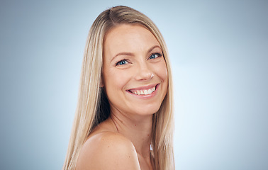 Image showing Face portrait, beauty and hair care of woman in studio isolated on a gray background mockup. Skincare, makeup cosmetics and female model happy after salon treatment for balayage, hairstyle and growth