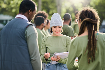 Image showing Volunteering, team and people in nature for community service, support and planning of leadership goals. Ngo, charity person with schedule or task management in forest, park or eco friendly project