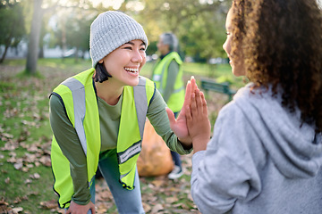 Image showing High five, volunteer woman and child cleaning garbage pollution, waste product or community environment support. Teamwork celebration, NGO charity and eco friendly kid happy with nature park clean up