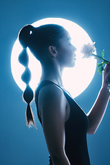 Image showing Circle light, beauty and art of woman in studio with flower for dark aesthetic, magic and futuristic scifi background. Hair, fashion and creative model or person with rose on moon spotlight mockup
