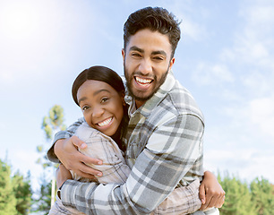 Image showing Couple, portrait smile and hug for summer vacation, travel or holiday break together outdoors. Happy man and woman hugging, smiling and enjoying traveling, trip or getaway in nature happiness