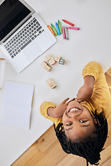 Image showing Education portrait, notebook and kid with laptop for online home school, remote elearning and child development. E learning, color crayons and top view of African student study with creative software