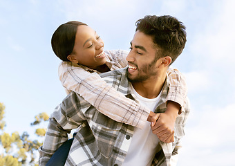 Image showing Nature sky, diversity and happy couple hug on outdoor time together, hiking adventure or forest trekking journey. Peace, freedom and love bond for black woman, man or fun people piggyback in woods