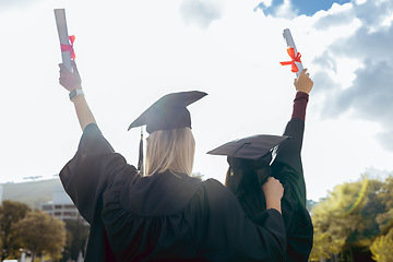 Image showing Graduation, woman friends and certificate with back for celebration, happiness or success for studying together. University student, black woman and diversity for goal, vision and support at campus