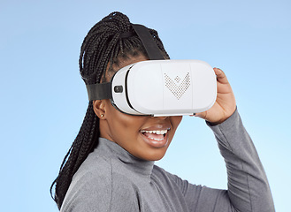 Image showing Metaverse, gaming and vr with black woman and headset for future, cyber and 3d system. Media, ui and web technology with gamer for internet, augmented reality and digital in blue background studio