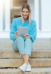 Image showing Woman, student and smile with tablet on stairs for social media, browsing or research relaxing at the campus. Happy female learner smiling for streaming entertainment or 5G connection on touchscreen