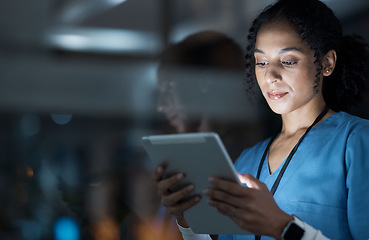 Image showing Medical, research and night with doctor and tablet for planning, medicine and schedule. Technology, review and digital with black woman reading report for healthcare, science and life insurance news