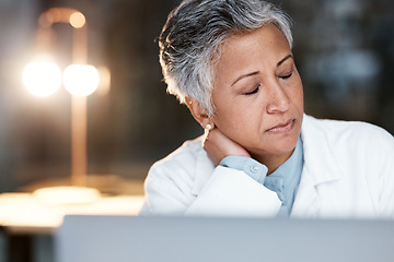 Image showing Night, stress and neck pain with doctor at laptop for medical, thinking and deadline review. Burnout, accountability and mental health with senior woman for healthcare, medicine and science research