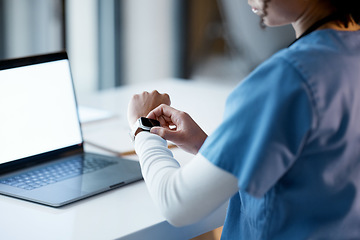 Image showing Smartwatch, healthcare and time with a woman nurse working late at night on a laptop in the hospital. Medical, watch and overtime with a female medicine professional at work on a computer in a clinic