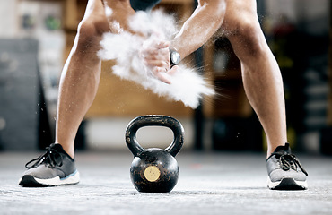 Image showing Fitness, powder or hands with a kettlebell for training, workout or exercise with chalk dust for grip strength. Bodybuilder, mindset or healthy athlete with a heavy weight, motivation or focus at gym