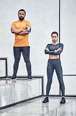 Image showing Man, woman and fitness portrait with arms crossed on steps in city with for exercise, wellness and training in Atlanta. Two athletes standing ready for urban workout, sports goals and focus people