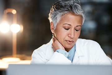 Image showing Night, neck pain and burnout with doctor at laptop for medical, thinking and deadline review. Stress, accountability and mental health with senior woman for healthcare, medicine and science research