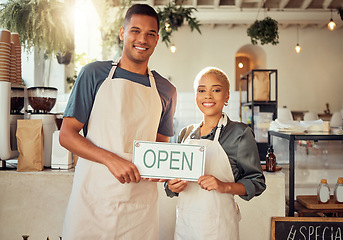 Image showing Colleagues, coworkers and small business owners with open sign and happy at restaurant in support together. Team, collaboration and friends smiling for startup growth and proud of success or vision