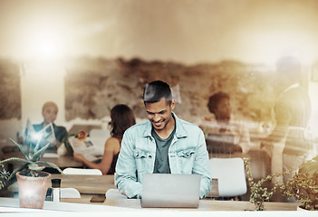 Image showing Smile, work and man with laptop in coffee shop networking for freelance content marketing job in restaurant window. Technology, social media and remote work for happy freelancer in cafe with computer