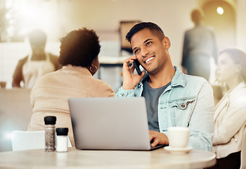 Image showing Creative man, phone and laptop at cafe with smile for communication, networking or conversation. Happy male freelancer smiling for call, discussion or startup on smartphone at coffee shop restaurant