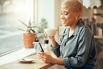 Image showing Coffee shop, phone and social media with a black woman customer drinking while typing a text message by a window. Internet cafe, mobile or communication with a female enjoying a drink in a restaurant