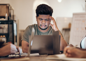 Image showing Businessman, thinking and stress on laptop in modern office, startup or creative company with ideas, vision or strategy planning. Confused, doubt and question for worker on technology in team meeting