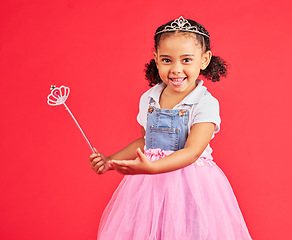 Image showing Portrait, child and princess dress with magic wand, fantasy and red background on studio mockup. Happy kids, fairytale clothes and fashion crown with smile, play or happiness in girly ballerina skirt