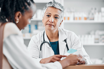 Image showing Pharmacy, senior woman help client and prescription for healthcare, diagnosis and cure for illness and disease. Medical professional, female customer or lady reading information, assist or pharmacist