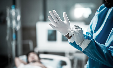 Image showing Hands, gloves and surgeon preparing for surgery in a consultation room in the hospital. Healthcare, surgical and medical doctor ready for a operation in the ER or emergency theatre in medicare clinic