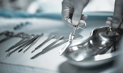 Image showing Healthcare, surgeon and medical instruments for surgery in a ER or operating room in the hospital. Emergency, steel appliances and nurse giving tools to a doctor for a operation in surgical theatre.