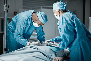 Image showing Hospital, surgery and healthcare doctors in operating room for emergency operation on patient. Health, collaboration and team of medical surgeons working with surgical tools to save a life in clinic.