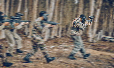Image showing Motion, blur and men running during paintball game, competition and military training in nature. War, field and friends moving with gun for battle, action and cardio in the woods or forest of Mexico
