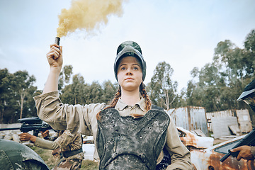 Image showing Nature, battle and girl with smoke during paintball, military training and army game in Spain. War, alert and woman playing with gear and equipment during a competition, sports and action on a field