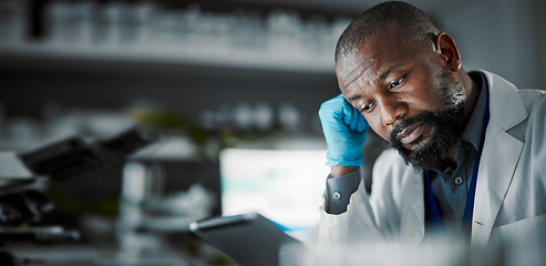 Image showing Scientist man, stress and medical technology in a laboratory with a tablet and slow internet. Medical science person or doctor frustrated at desk for research with fatigue, burnout and mental health