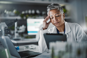 Image showing Headache, tired and scientist woman in laboratory working on tablet for pharmaceutical research or data results. Mental health, fatigue and burnout senior, science person sad, stress or risk report