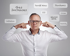 Image showing Portrait, economy and inflation with a business man in studio on a gray background standing fingers in ears. Stress, debt or pandemic with a male employee indoor to ignore bad news and cost increase