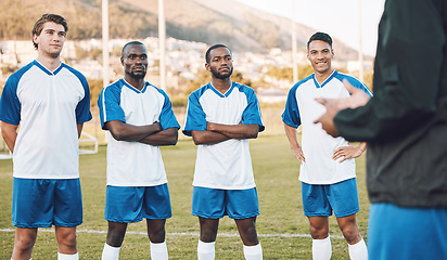 Image showing Team, football player and coaching on field for sports training, games strategy and competition planning together. Focus, leadership and man talking to soccer people or men on pitch for workout goals