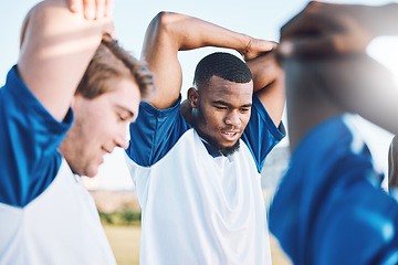 Image showing Football, sports and stretching with a team outdoor on a field getting ready together for a competitive game. Soccer, fitness and warm up with a male sport group of friends on a pitch before a match