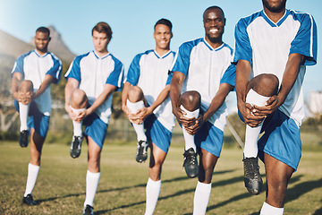 Image showing Soccer men, team stretching and training for sports competition or game with teamwork on a field. Football group people doing warm up exercise or workout for performance and fitness goals on grass