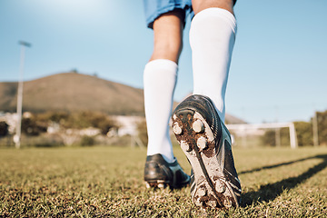 Image showing Soccer player, shoes and start on field with sports and fitness outdoor, athlete legs and running in training session. Football, wellness and active lifestyle, professional sport man and team game