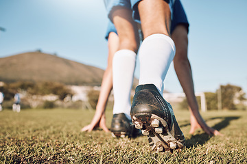 Image showing Football player, shoes and start on field with sports and fitness outdoor, athlete legs and running in training session. Soccer, wellness and active lifestyle, professional sport man and team game