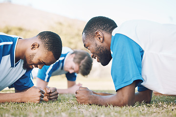 Image showing Push up, team and football player coaching on field for training, practice and sports challenge and muscle power. Group of soccer people or men on grass or ground for workout with personal trainer