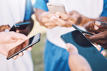 Image showing Connection, social media and hands with phone for communication, bluetooth and soccer chat. Networking, sync and football players reading information or strategy on a mobile in a circle for sports