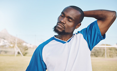 Image showing Soccer, black man and stretching before game, training or exercise for wellness, preparation for match or energy. African American male athlete, guy or football player stretch neck, fitness or sports