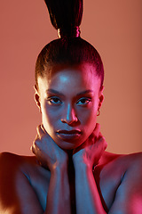 Image showing Portrait, art and neon with a model black woman in studio on a kaleidoscope background for beauty. Face, makeup and style with an attractive young female posing indoor for culture or cosmetics