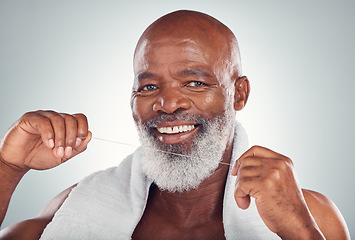 Image showing Floss, portrait and teeth of man isolated on white background for senior mouth, self care smile and cleaning. African model or elderly person with product for tooth, gum or dentist healthcare mockup