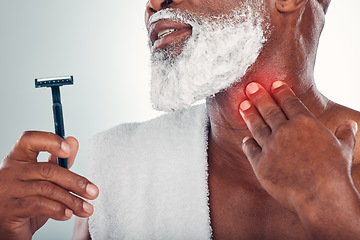 Image showing Man, shaving and hand on neck for pain from razor burn or cut while grooming with foam on face. Bathroom beard shave accident, blade and injury on throat, old male model isolated on white background.