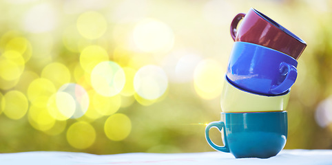 Image showing Coffee, tea and mockup with stack of cup in park for catering, breakfast and health. Brunch, health and design with pile of porcelain mugs on table for fine dining, buffet and kitchenware in nature