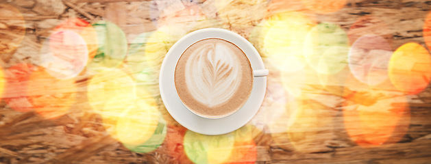 Image showing Flare, above and coffee on a table at a cafe for breakfast, lunch or morning energy at a restaurant. Drink, diner and latte, espresso or cappuccino at a coffee shop for peace, calm and caffeine