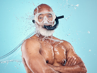 Image showing Water splash, snorkel and skincare of black man in studio isolated on blue background. Wellness, cleaning or face portrait of senior male model with scuba mask, bathing or washing for healthy hygiene