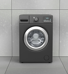 Image showing Black washing machine in laundry room
