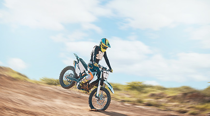 Image showing Motorcross, offroad driving and sports on sky for freedom. Driver, cycling and power on dirt track, motorcycle competition and motorbike performance on adventure course, fast action show and speed